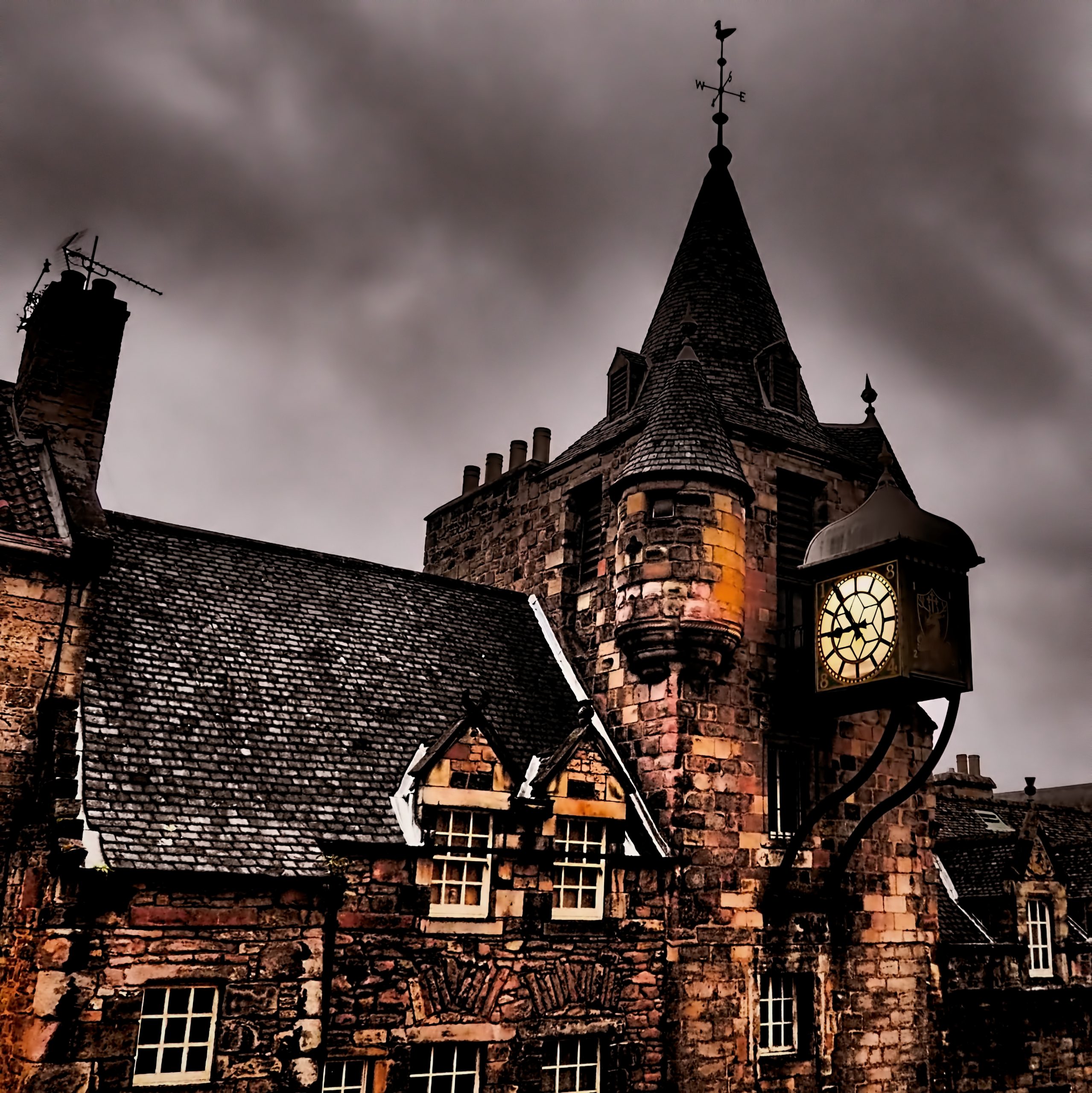 Edinburgh's Tolbooth Tavern Clock Tower at night